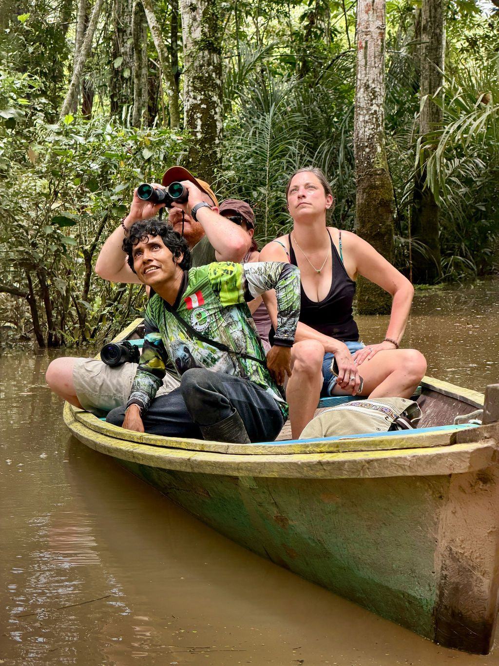 Quiet wildlife watching from a canoe with binoculars